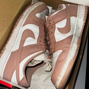 Dunks Low Rose Whisper size 10.5w/9m.
Nike Blush and White Athletic Shoes